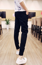 Pantalones deportivos tipo harem para hombre