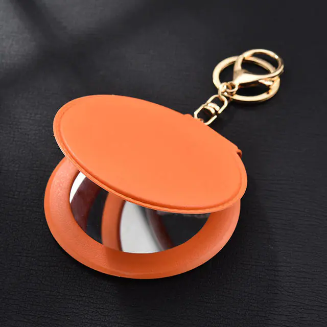 Espejo de maquillaje redondo plegable portátil de colores caramelo